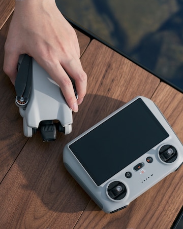 DJI Mini 3 Drone (with RC Remote Controller)