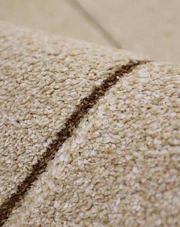 Sara Carved Triangle Rug